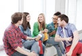 Students communicating and laughing at school Royalty Free Stock Photo