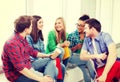 Students communicating and laughing at school Royalty Free Stock Photo