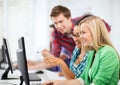 Students with computer studying at school Royalty Free Stock Photo