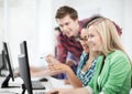 Students with computer studying at school Royalty Free Stock Photo