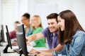 Students with computers studying at school Royalty Free Stock Photo