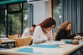 Focused students studying in a modern classroom environment Royalty Free Stock Photo