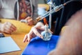 Students conduct experiments in chemistry class. Heating the test tube over the burner, close up