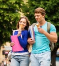 Students couple eating ice-cream