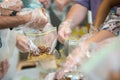 Students of coworkers making food for charity or homeless people