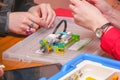 Students create a model of Lego robot