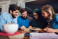 Students of diverse ethnic learning at home. Learning and preparing for university exam, selective focus Royalty Free Stock Photo