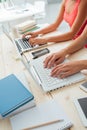 Students doing homeworks at desk Royalty Free Stock Photo