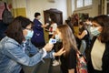 Students with face mask at school entrance