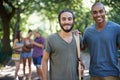 Students, friends and portrait on campus for learning, knowledge and education with support at college. Happy young men Royalty Free Stock Photo