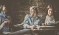 Students girls having fun in cafe. Royalty Free Stock Photo