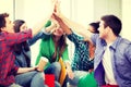 Students giving high five at school Royalty Free Stock Photo