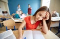 Students gossiping behind classmate back at school