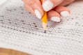 Students hands to take exams, writing an exam room with a pencil holding on an optical form of a standardized test with answers Royalty Free Stock Photo