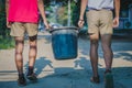 Students help to remove rubbish from the classroom to pile waste