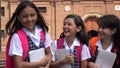 Girl Students Holding Notebooks Wearing School Uniforms Royalty Free Stock Photo