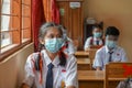 Students in Indonesia are following the learning process in class using faceshields and health masks to implement health protocols