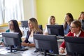 Students at an informatics lecture. Smart young people study at the college. Education, college, university, learning and people Royalty Free Stock Photo