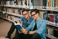 Students Learning Reading Book In University Library Royalty Free Stock Photo