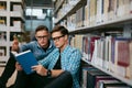 Students Learning Reading Book In University Library Royalty Free Stock Photo