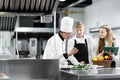 Students are learning to cook in a culinary institute with a standard kitchen and complete equipment. And have a professional chef