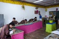 Students learning traditional Bhutanese wood carving