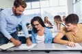 Students listening to professor in the classroom on college Royalty Free Stock Photo