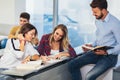 Students listening to professor in the classroom on college Royalty Free Stock Photo