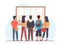 Students look at class schedule. Back view young people in college or school. Training course plan. Organizer or Royalty Free Stock Photo