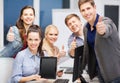 Students with monitor and blank tablet pc screen