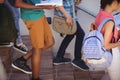 Students moving down staircase