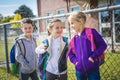 Students outside school standing together Royalty Free Stock Photo