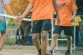 Students playing traditional asian sport game sepak takraw Royalty Free Stock Photo