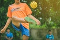 Students playing traditional asian sport game sepak takraw Royalty Free Stock Photo