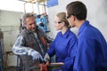 Students of plumbery with instructor Royalty Free Stock Photo