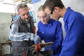 Students of plumbery with instructor Royalty Free Stock Photo