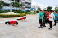 Students are pushing up as the punishment in or to come to school late in the deicipline conduct at Paknampran wittaya school