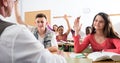 Students raising their hands up Royalty Free Stock Photo