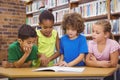 Students reading froma school book