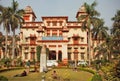 Students relaxing near the building of Bannares Hindu University with green area