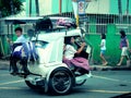 Students riding a tricycle