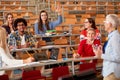 Students rising hands to answer the question in lecture Royalty Free Stock Photo