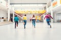 Students running to their classes in school main hall Royalty Free Stock Photo