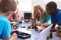 Students In After School Computer Coding Class Building And Learning To Program Robot Vehicle Royalty Free Stock Photo
