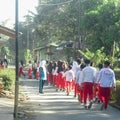 ,Students at school with sport uniforms doing some sports activity.