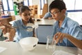 Students in science class, studying the reaction of dry ice Royalty Free Stock Photo