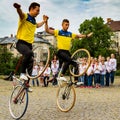 Students section of artistic cycling show stunts Royalty Free Stock Photo