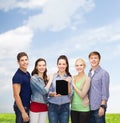 Students showing blank tablet pc screen Royalty Free Stock Photo