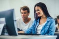 Students sitting in a classroom, using computers during class Royalty Free Stock Photo