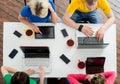 Students sitting at the table using computers Royalty Free Stock Photo